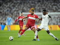 Josha Vagnoman right-back of Stuttgart and Germany and Vinicius Junior left winger of Real Madrid and Brazil compete for the ball during the...