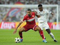 Josha Vagnoman right-back of Stuttgart and Germany and Vinicius Junior left winger of Real Madrid and Brazil compete for the ball during the...