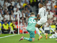 Kylian Mbappe centre-forward of Real Madrid and France and Alexander Nubel goalkeeper of Stuttgart and Germany compete for the ball during t...