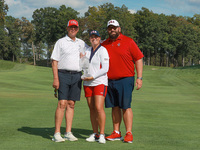 GAINESVILLE, VIRGINIA - SEPTEMBER 15: Lauren Coughlin of the United States poses with her significant other as well as her caddie while hold...