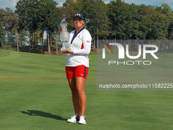 GAINESVILLE, VIRGINIA - SEPTEMBER 15: Lauren Coughlin of the United States poses while holding the trophy after a Team USA win at the conclu...