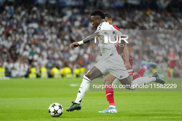 Vinicius Junior left winger of Real Madrid and Brazil in action during the UEFA Champions League 2024/25 League Phase MD1 match between Real...