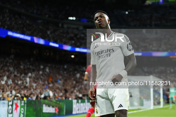 Vinicius Junior left winger of Real Madrid and Brazil reacts during the UEFA Champions League 2024/25 League Phase MD1 match between Real Ma...