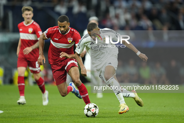 Kylian Mbappe centre-forward of Real Madrid and France and Josha Vagnoman right-back of Stuttgart and Germany compete for the ball during th...