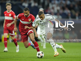 Kylian Mbappe centre-forward of Real Madrid and France and Josha Vagnoman right-back of Stuttgart and Germany compete for the ball during th...