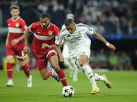 Kylian Mbappe centre-forward of Real Madrid and France and Josha Vagnoman right-back of Stuttgart and Germany compete for the ball during th...