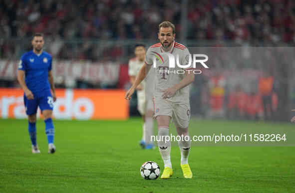 Harry Kane of Bayern Munich    controls the ball  during the Champions League Round 1 match between Bayern Munich v Dinamo Zagreb, at the Al...