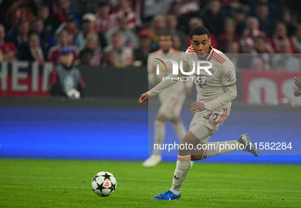 Jamal Musiala of Bayern Munich    controls the ball  during the Champions League Round 1 match between Bayern Munich v Dinamo Zagreb, at the...