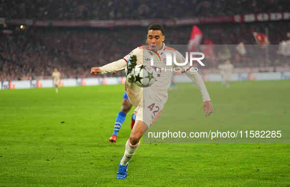 Jamal Musiala of Bayern Munich    controls the ball  during the Champions League Round 1 match between Bayern Munich v Dinamo Zagreb, at the...