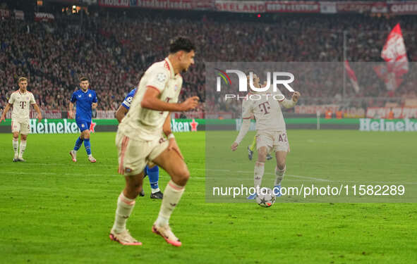 Jamal Musiala of Bayern Munich    controls the ball  during the Champions League Round 1 match between Bayern Munich v Dinamo Zagreb, at the...