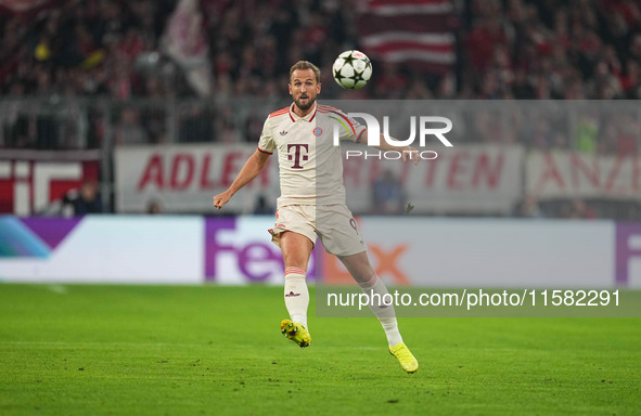 Harry Kane of Bayern Munich    controls the ball  during the Champions League Round 1 match between Bayern Munich v Dinamo Zagreb, at the Al...