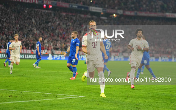 Harry Kane of Bayern Munich    celebrates  the teams first goal  during the Champions League Round 1 match between Bayern Munich v Dinamo Za...