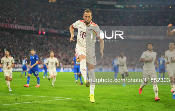 Harry Kane of Bayern Munich    celebrates  the teams first goal  during the Champions League Round 1 match between Bayern Munich v Dinamo Za...