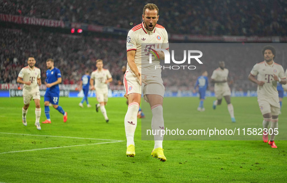 Harry Kane of Bayern Munich    celebrates  the teams first goal  during the Champions League Round 1 match between Bayern Munich v Dinamo Za...