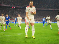 Harry Kane of Bayern Munich    celebrates  the teams first goal  during the Champions League Round 1 match between Bayern Munich v Dinamo Za...