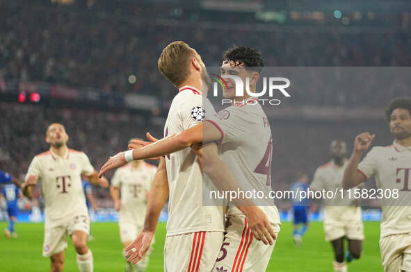 Harry Kane of Bayern Munich    celebrates  the teams first goal  during the Champions League Round 1 match between Bayern Munich v Dinamo Za...