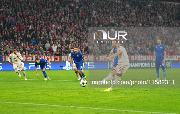 Harry Kane of Bayern Munich    scores the teams first goal  during the Champions League Round 1 match between Bayern Munich v Dinamo Zagreb,...