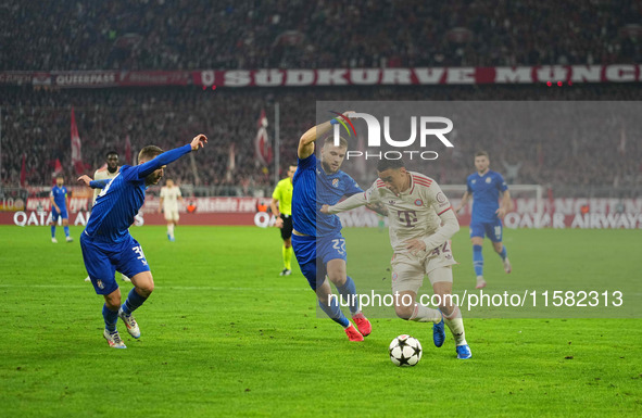 Jamal Musiala of Bayern Munich    controls the ball  during the Champions League Round 1 match between Bayern Munich v Dinamo Zagreb, at the...