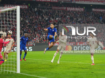 Michael Olise of Bayern Munich    scores the teams third goal  during the Champions League Round 1 match between Bayern Munich v Dinamo Zagr...