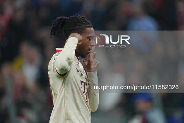 Michael Olise of Bayern Munich    celebrates  the teams third goal  during the Champions League Round 1 match between Bayern Munich v Dinamo...