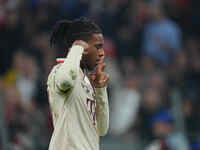 Michael Olise of Bayern Munich    celebrates  the teams third goal  during the Champions League Round 1 match between Bayern Munich v Dinamo...