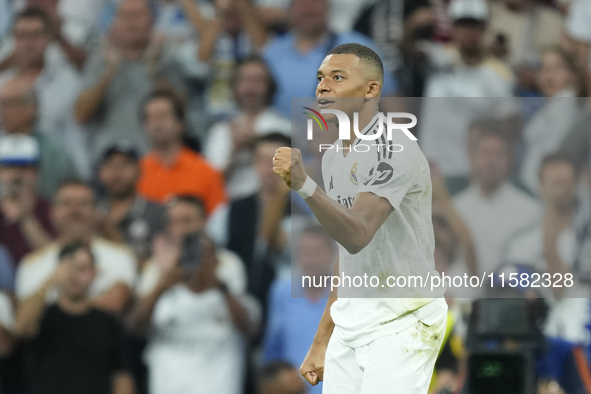 Kylian Mbappe centre-forward of Real Madrid and France celebrates after scoring his sides first goal during the UEFA Champions League 2024/2...