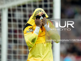 Mike Maignan of AC Milan leaves the pitch injured during the UEFA Champions League 2024/25 League Phase MD1 match between AC Milan and Liver...