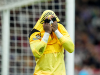 Mike Maignan of AC Milan leaves the pitch injured during the UEFA Champions League 2024/25 League Phase MD1 match between AC Milan and Liver...