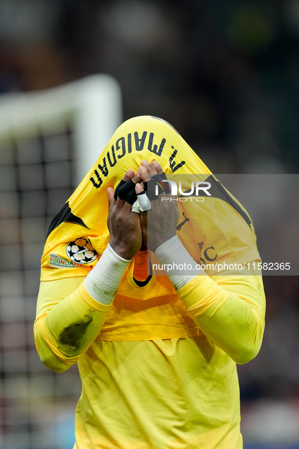 Mike Maignan of AC Milan leaves the pitch injured during the UEFA Champions League 2024/25 League Phase MD1 match between AC Milan and Liver...