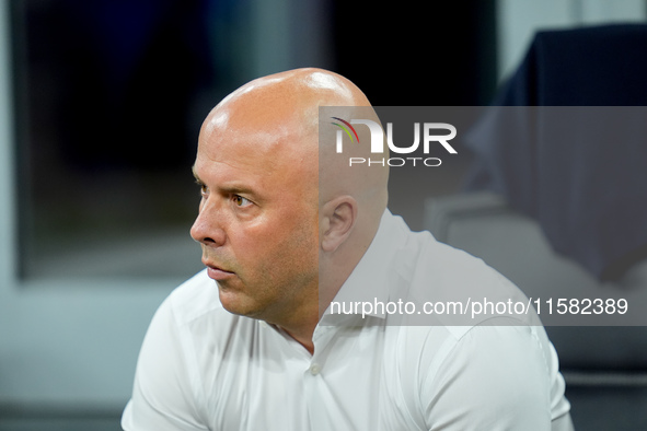 Arne Slot head coach of Liverpool FC looks on during the UEFA Champions League 2024/25 League Phase MD1 match between AC Milan and Liverpool...