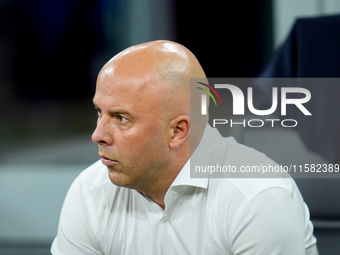 Arne Slot head coach of Liverpool FC looks on during the UEFA Champions League 2024/25 League Phase MD1 match between AC Milan and Liverpool...