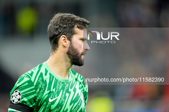 Alisson Becker of Liverpool FC looks on during the UEFA Champions League 2024/25 League Phase MD1 match between AC Milan and Liverpool FC at...