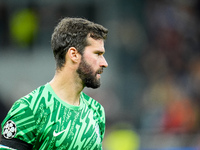 Alisson Becker of Liverpool FC looks on during the UEFA Champions League 2024/25 League Phase MD1 match between AC Milan and Liverpool FC at...