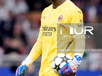 Mike Maignan of AC Milan looks on during the UEFA Champions League 2024/25 League Phase MD1 match between AC Milan and Liverpool FC at Stadi...