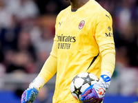 Mike Maignan of AC Milan looks on during the UEFA Champions League 2024/25 League Phase MD1 match between AC Milan and Liverpool FC at Stadi...