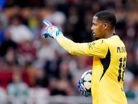 Mike Maignan of AC Milan looks on during the UEFA Champions League 2024/25 League Phase MD1 match between AC Milan and Liverpool FC at Stadi...