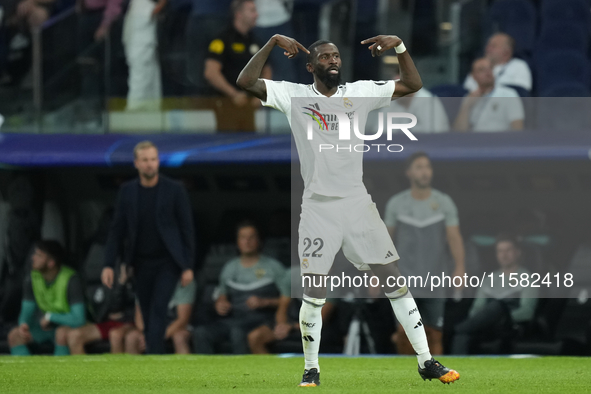 Antonio Rudiger centre-back of Real Madrid and Germanycelebrates after scoring his sides first goal during the UEFA Champions League 2024/25...