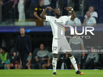 Antonio Rudiger centre-back of Real Madrid and Germanycelebrates after scoring his sides first goal during the UEFA Champions League 2024/25...