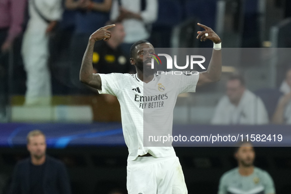 Antonio Rudiger centre-back of Real Madrid and Germanycelebrates after scoring his sides first goal during the UEFA Champions League 2024/25...