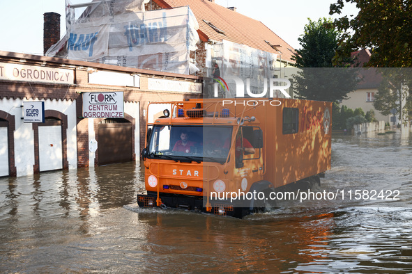 Emergency workers are patroling the town after Nysa Klodzka river flooded town of Lewin Brzeski in southwestern Poland, on September 17th, 2...