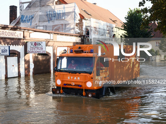 Emergency workers are patroling the town after Nysa Klodzka river flooded town of Lewin Brzeski in southwestern Poland, on September 17th, 2...