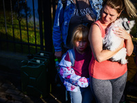 Residents which were evacuated by emergency workers after Nysa Klodzka river flooded town of Lewin Brzeski in southwestern Poland, on Septem...