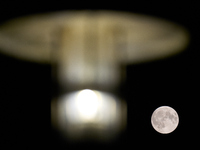 The Harvest Moon full moon is seen in the night sky over Frankfurt an der Oder, Germany on 17 September, 2024. (