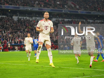 Harry Kane of Bayern Munich    celebrates  the teams sixth goal  during the Champions League Round 1 match between Bayern Munich v Dinamo Za...