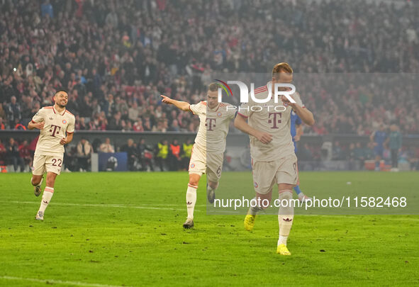 Harry Kane of Bayern Munich    celebrates  the teams seventh goal  during the Champions League Round 1 match between Bayern Munich v Dinamo...