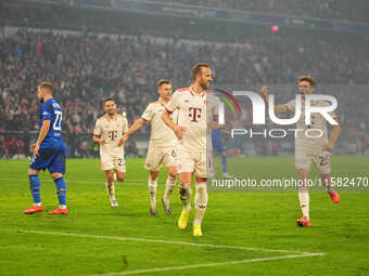 Harry Kane of Bayern Munich    celebrates  the teams seventh goal  during the Champions League Round 1 match between Bayern Munich v Dinamo...