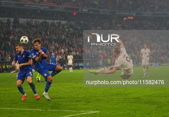 Harry Kane of Bayern Munich    shoots on goal  during the Champions League Round 1 match between Bayern Munich v Dinamo Zagreb, at the Allia...