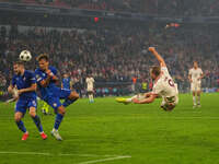 Harry Kane of Bayern Munich    shoots on goal  during the Champions League Round 1 match between Bayern Munich v Dinamo Zagreb, at the Allia...