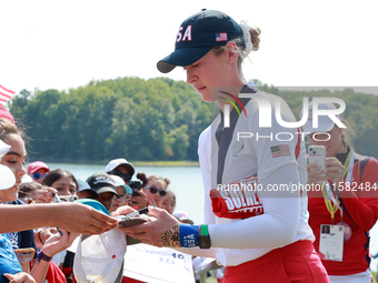 GAINESVILLE, VIRGINIA - SEPTEMBER 15: Nelly Korda of the United States signs autographs after a Team USA win at the conclusion of the Solhei...