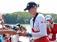 GAINESVILLE, VIRGINIA - SEPTEMBER 15: Nelly Korda of the United States signs autographs after a Team USA win at the conclusion of the Solhei...